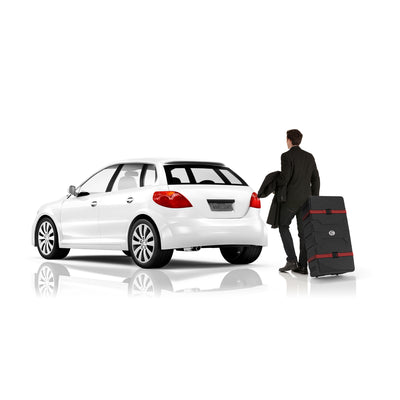 Man walking with wheeled trade show case next to a car, ideal for exhibitions and special events