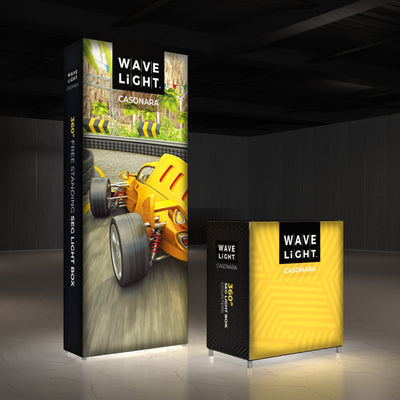 Trade show display with illuminated light box and counter featuring racing car and Wave Light branding