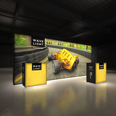Illuminated trade show display featuring curved racing car graphics and branded light boxes for exhibitions