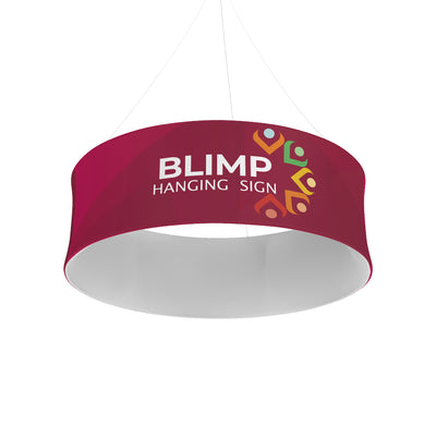 Round hanging blimp sign suspended by wires for trade shows, exhibitions, and special event displays