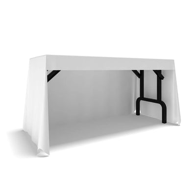 Draped table cover on folding table for trade shows and exhibition displays