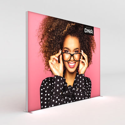 Large trade show lightbox display featuring a smiling woman with glasses and curly hair for exhibitions and events