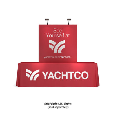 Trade show tabletop display with branded fabric banner and back panel for exhibitions and events