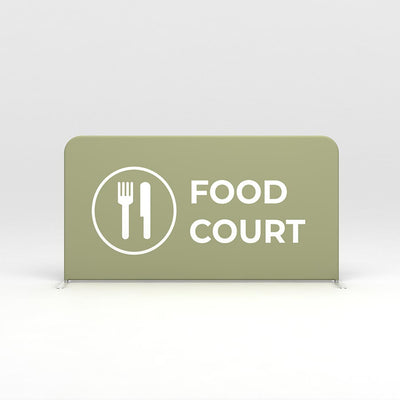 Freestanding trade show barrier with food court signage featuring fork and knife icon for event navigation