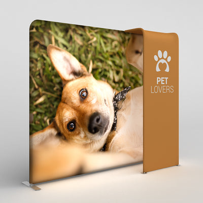 Trade show display featuring close-up image of dog lying on grass with pet lovers logo on side panel
