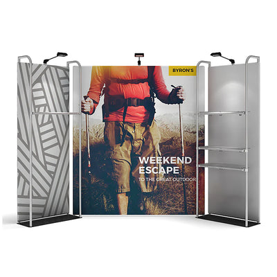 Trade show display with large outdoor adventure graphic and shelving for exhibitions and events