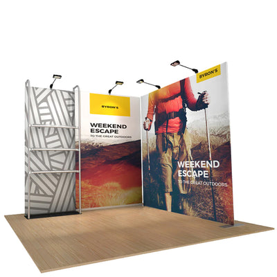 Trade show display with large graphic panels and shelving for exhibitions and special events