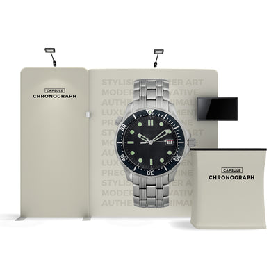 Trade show display with large watch graphic, branded backdrop, counter, and monitor for exhibitions