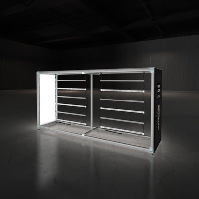 Modular illuminated trade show counter with LED light panels and hanging bar display in exhibition space
