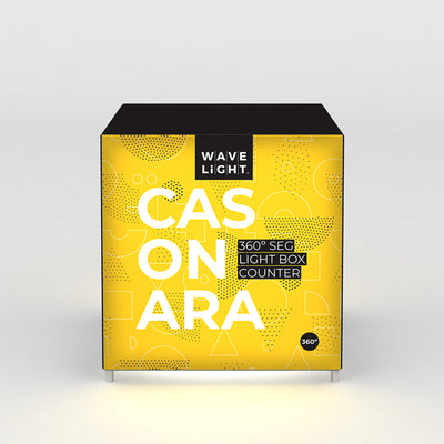 Illuminated trade show counter with bold graphic branding and clear signage for exhibitions and events