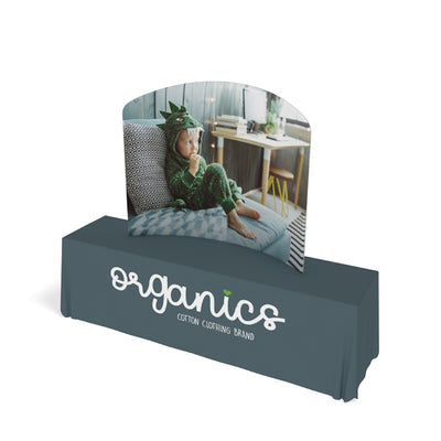 Curved tabletop display with branded fabric table cover for trade shows and special events