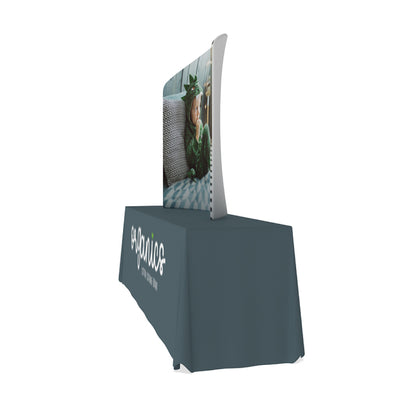 Curved tabletop display with printed graphic and branded tablecloth for trade shows and exhibitions
