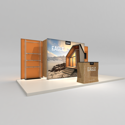 Trade show display system with large lightbox graphic, shelving, and branded counter for exhibitions