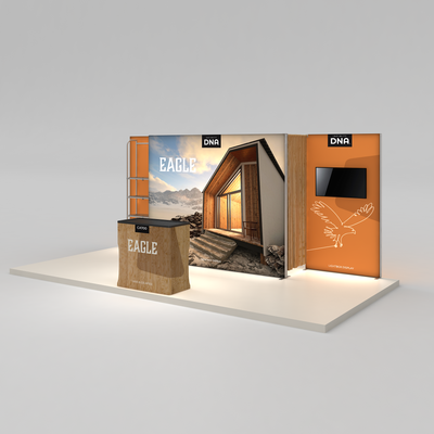 Trade show display system featuring illuminated graphic panels, a counter, and a mounted screen for exhibitions and events