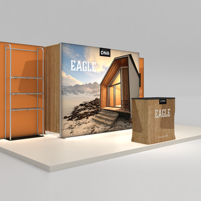 Trade show display system featuring lightbox backdrop and counter for exhibitions and special events