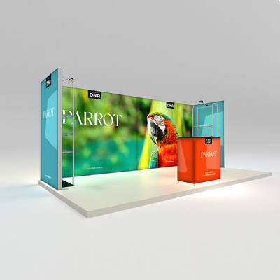 Trade show exhibit display system featuring large parrot graphic and illuminated counter for events
