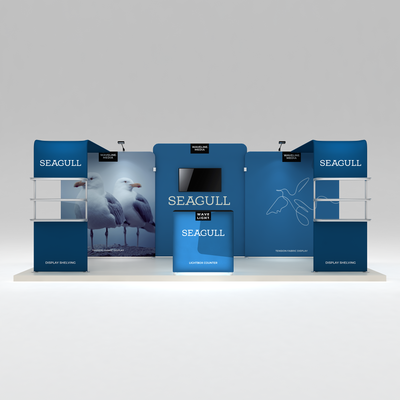 Trade show display system with tension fabric graphics, lightbox counter, shelving, and monitor