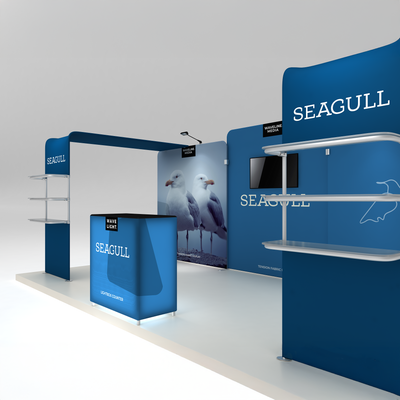 Trade show exhibit system with tension fabric displays, lightbox counter, and shelving for exhibitions