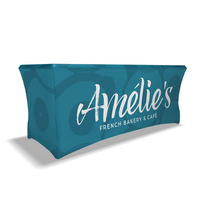 Stretch table cover with Amelie's French Bakery & Café branding for trade shows and events