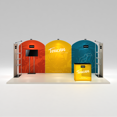 Modular trade show display system with curved fabric backdrops, media stands, and lightbox counter for exhibitions