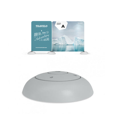 Trade show display with a two-panel backdrop featuring adventure branding and iceberg imagery, secured by weighted base