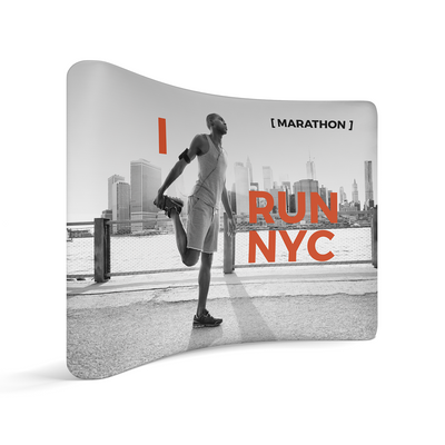 Curved tension fabric trade show display featuring marathon runner and NYC skyline graphics