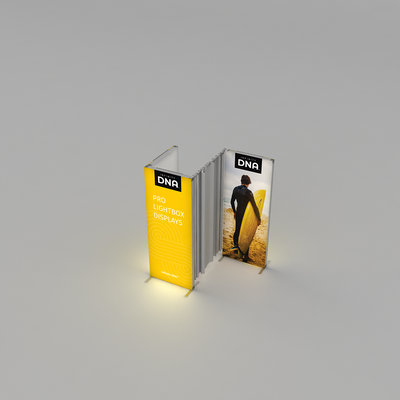 Trade show lightbox display featuring illuminated panels with branding and beach surfer image